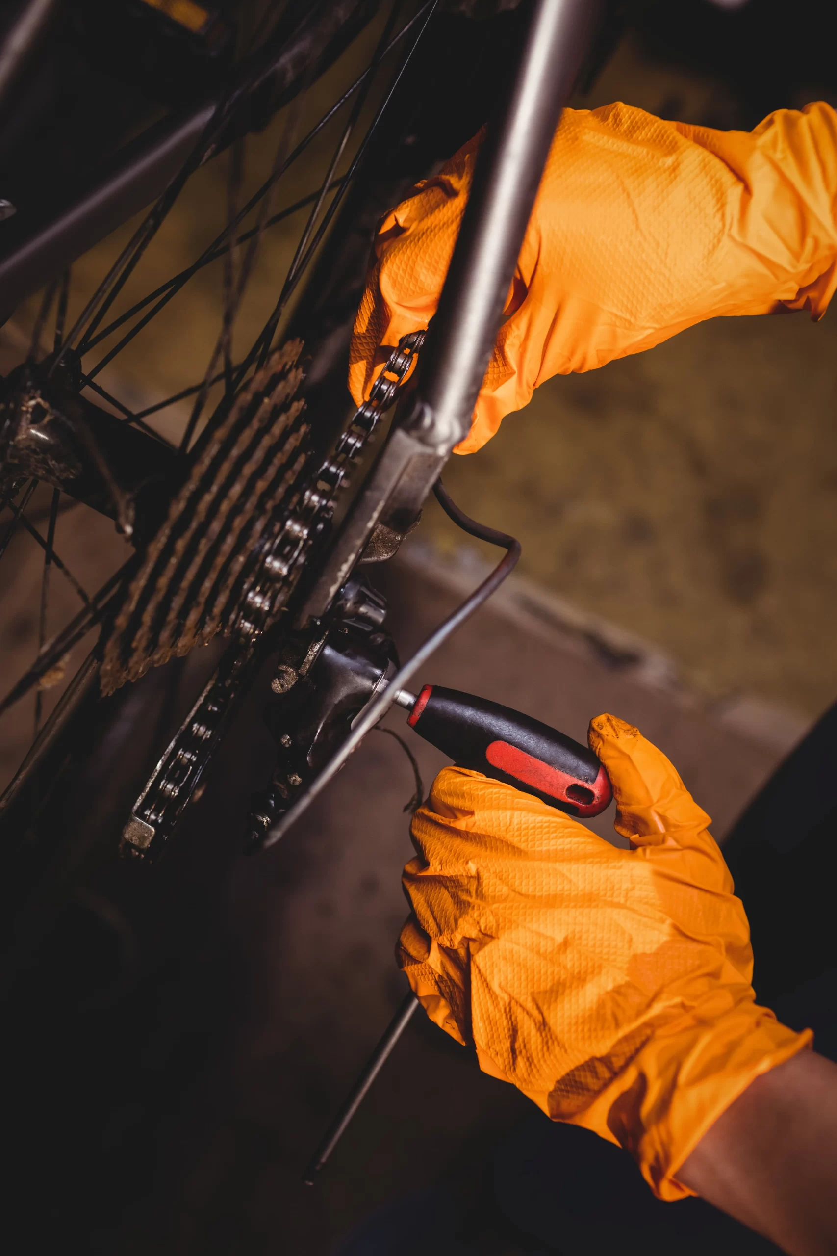 mechanic-repairing-bicycle-min-scaled.webp